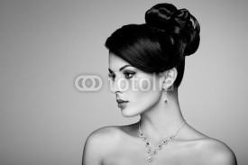 Fototapety Fashion portrait of young beautiful woman with jewelry and elegant hairstyle. Brunette girl. Perfect make-up.  Beauty style woman with diamond accessories. Black and White