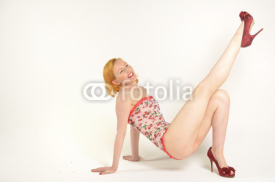 Fototapety woman in retro underwear kicking