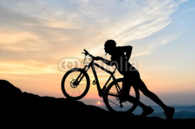 Naklejki cyclist in the sunset
