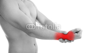 Fototapety Sportsman with pain in wrist isolated on white