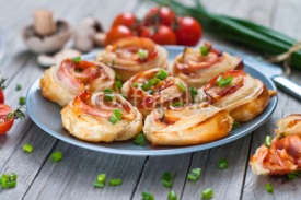 Fototapety Puff pastry rolls with ham and chese. Baked snacks