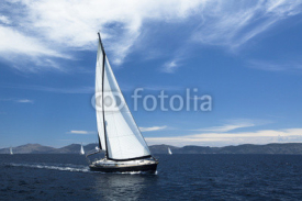 Obrazy i plakaty Sailing ship yachts with white sails.