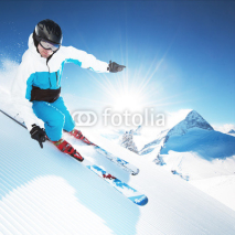 Naklejki Skier in mountains, prepared piste and sunny day