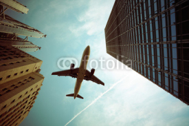 Fototapety airplane and modern building
