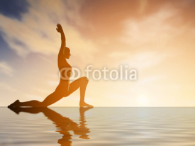 Fototapety Silhouette young woman practicing yoga at sunset