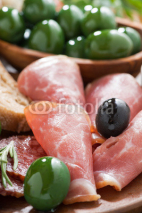 Fototapety assorted Italian antipasti - deli meats, olives and ciabatta