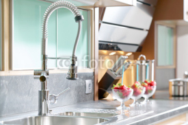 Fototapety Professional single lever faucet in modern kitchen