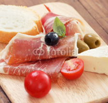 Naklejki sliced prosciutto with olive cheese and Cherry tomato