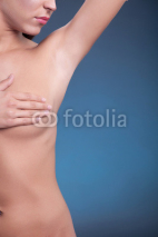 Naklejki woman examining breast mastopathy or cancer