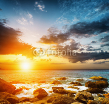 Obrazy i plakaty Amazing sky over the sea. Sunset landscape