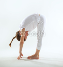 Naklejki Young girl doing yoga