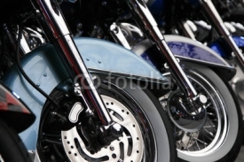 Obrazy i plakaty row of motorcycle wheels