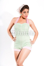 Naklejki Sexy fifties pin-up girl with pink lipstick wearing a green and