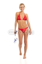 Naklejki Young woman in red bikini holding snorkel