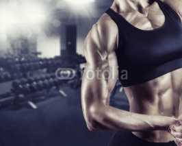 Naklejki Woman's body bodybuilder