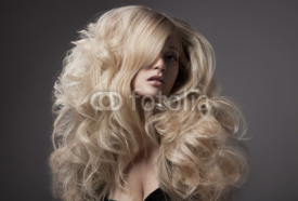 Naklejki Beautiful Blond Woman. Curly Long Hair