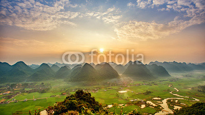 Sunrise Colorful rice field in valley around with mountain panor