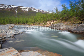 Obrazy i plakaty Long exposure of river in the canyon in Abisko National Park.