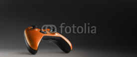 Naklejki Video game controller isolated on darkness background