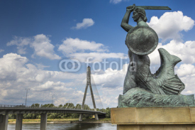 Obrazy i plakaty The Warsaw Mermaid called Syrenka on the Vistula River bank in W