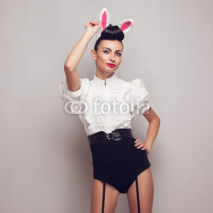 Naklejki Sexy pinup model posing in vintage bunny costume