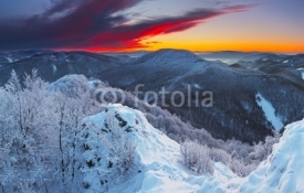 Naklejki Majestic sunrise in the winter mountains landscape