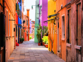 Naklejki Colorful street in Burano, near Venice, Italy