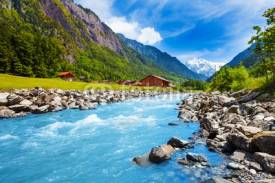 Fototapety Swiss landscape with river stream and houses