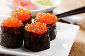 Naklejki Mixed sushi set on a white plate
