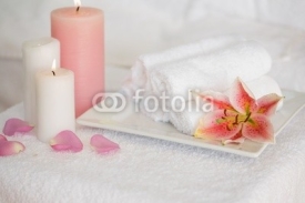 Naklejki Candles and fresh white towels with lily