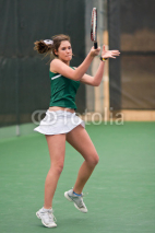 Naklejki Female Tennis Player Finishes Forehand Follow Through