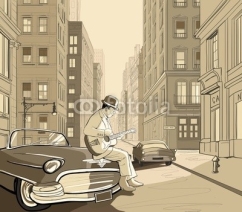 Naklejki guitarist in an old street of New york