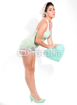 Fototapety Sexy fifties pin-up girl with pink lipstick wearing a green and