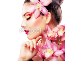 Obrazy i plakaty Beauty Portrait. Beautiful Stylish Girl with Orchid Flower