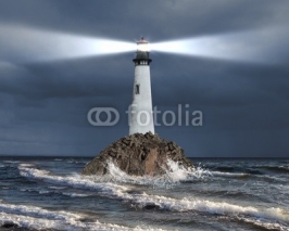 Naklejki Lighthouse with a beam of light