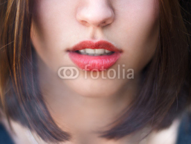 Fototapety face of a girl with sexy lips