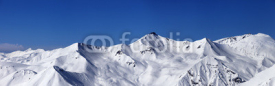 Fototapety Panoramic view on off-piste slopes and blue sky at nice day