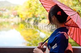 Naklejki japanese kimono woman in autumn