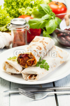Naklejki Mexican burritos on a plate