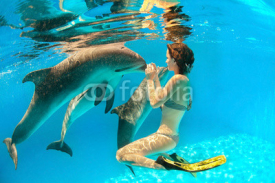 Naklejki Dolphin and girl