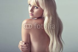 Obrazy i plakaty Cute blonde lady with soft skin