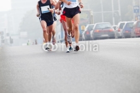 Naklejki People running in city marathon