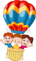 Naklejki Happy kids riding a hot air balloon