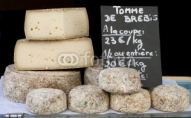 Naklejki Stack of Biger France Cheese sale im the market.