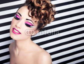 Fototapety Beautiful young woman with professional party make up