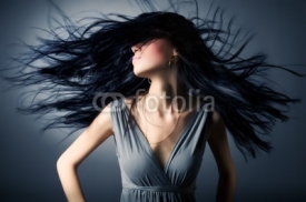 Naklejki Woman with fluttering hair