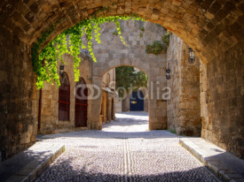 Fototapety Medieval arched street in the old town of Rhodes, Greece