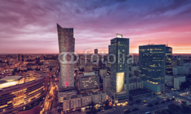 Fototapety Warsaw Downtown, Poland. Sunset behind the skyscrapers