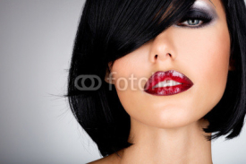 Naklejki Beautiful brunette woman with shot hairstyle and sexy red lips