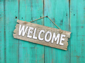 Fototapety Welcome sign hanging on rustic background